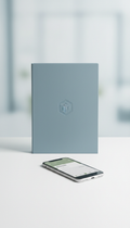 Soft blue notebook with debossed logo